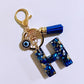 Blue Resin Initial Keychain - Evil Eye Letter Charm with Rhinestones & Tassel, Stylish Gift for Women, Lobster Clasp Accessory
